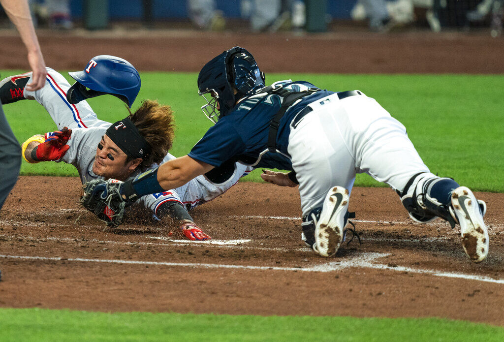 APTOPIX Rangers Mariners Baseball